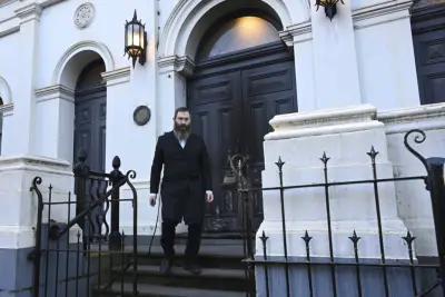 Congregation flees after arsonist sets fire to an Australian synagogue door