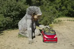 Giant trolls built from trash want to save humans from themselves