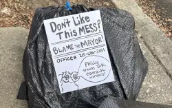 As municipal strike hits its 7th day, protesters dump trash in City Hall — and get arrested