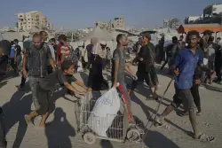 Israel begins a limited pause in fighting in 3 Gaza areas as concerns over hunger mount